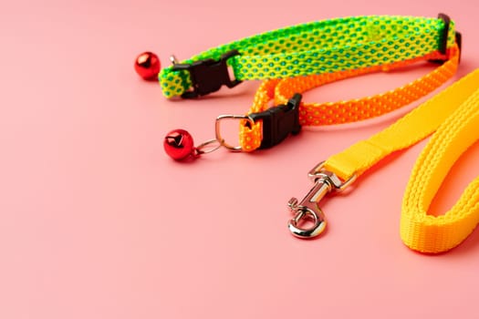 Textile pet collar on pink background studio photo close up