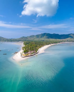 Drone aerial view at Koh Muk a tropical island in Trang Southern Thailand, a turqouse colored ocean in Koh Mook Trang Thailand