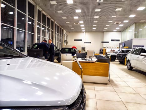 Kirov, Russia - November 21, 2023: Car in showroom of dealership Lada Avtovaz. Sale of Russian cars in Russia country