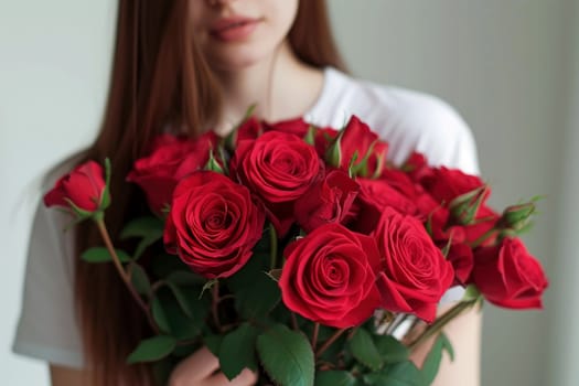 a woman holding a bouquet of roses.ai generative.