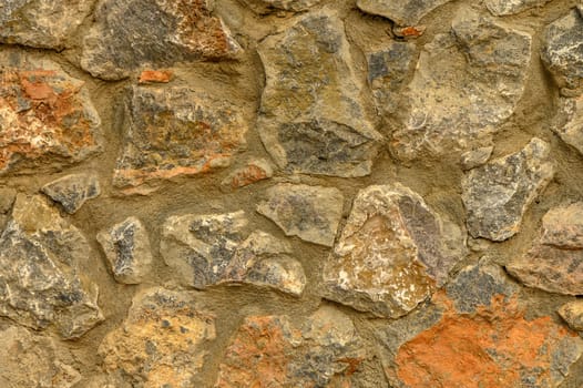 stone wall illuminated by the sun as a background