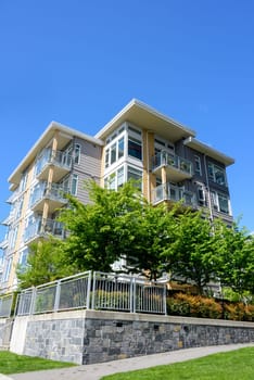 New residential building on land terrace with retaining wall