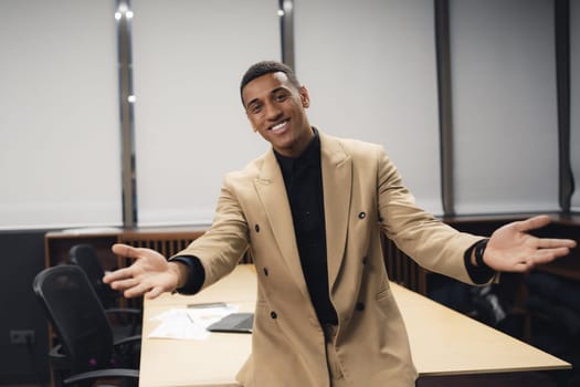 Excited diverse employee celebrating teamwork.