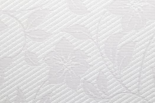 This image features a detailed close-up of a light gray textured vinyl wallpapers showcasing a intricate diagonal weave pattern with floral elements.