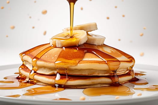 Stack of pancakes with syrup and banana slices.