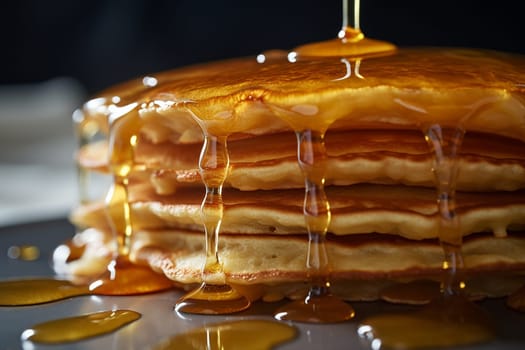 Waffles drizzled with caramel sauce and nuts.