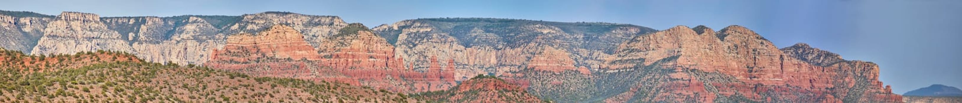 Vibrant Panoramic View of Sedona's Striking Mountain Strata, Arizona 2016 - A Serene Display of Natural Wilderness and Geological Beauty