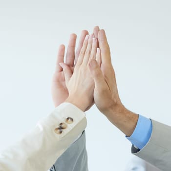 High five, success and hands of people with celebration of achievement and support for teamwork. Business, collaboration and team building gesture for cooperation, solidarity and pride for winning.