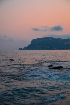 Beautiful eveining scene on Alanya beach in Turkey