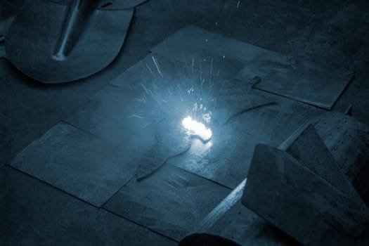 Laser cleaning of metal. The laser beam cleans the metal surface from rust. Laser removes removing old rust from metal. Innovation metalworking. New technologies