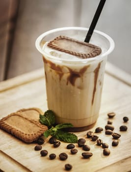 Delicious and refreshing coffee based beverage, ice coffee, cold drink, coffee beans in the cafe