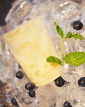Delicious and refreshing coffee based beverage, ice coffee, cold drink, coffee beans in the cafe