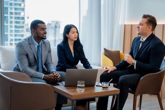 Group of diverse executive investor listening businessman talking about investment. Professional business team discussing about business plan, statistic, marketing strategy at office. Ornamented.