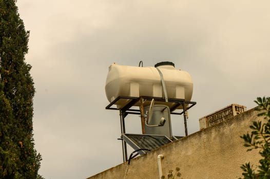 tank for heating water on the roof in a village in Cyprus