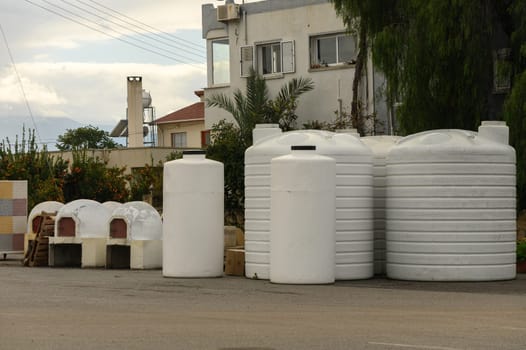 selling water tanks in a village in Cyprus 2