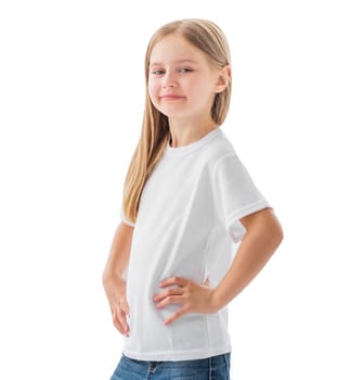 Beautiful little girl posing in a white blank t-shirt isolated on a white background