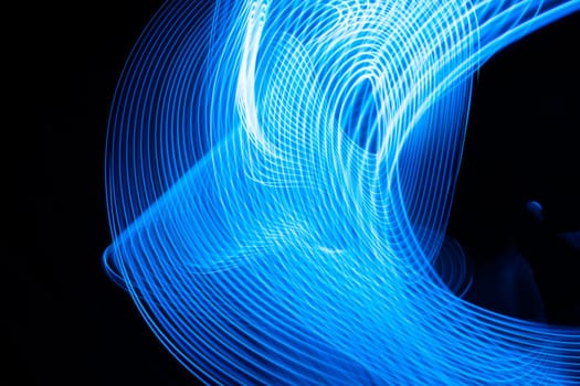 Abstract neon metallic blue curvy lines modern banner design on dark background. High quality photo