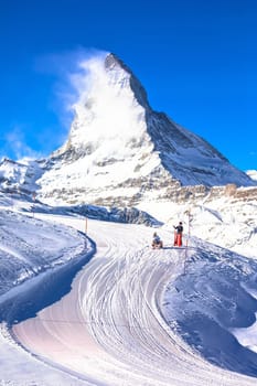 Ski slope under Mattherhorn Alps peak, Zermatt ski area, Switzerland