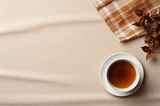 Top view of a cup of tea on a table in a cafe.