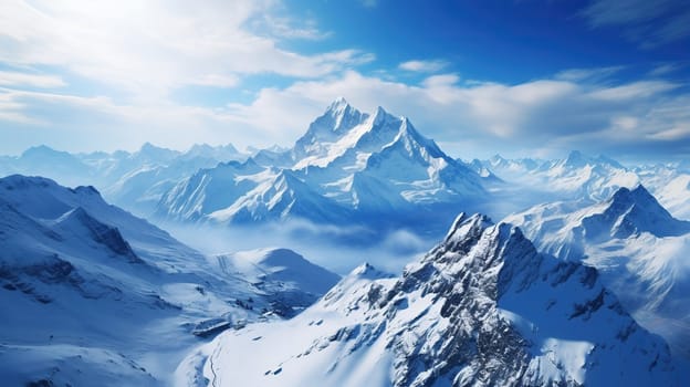 Aerial view of the peaks of snow-capped mountains.