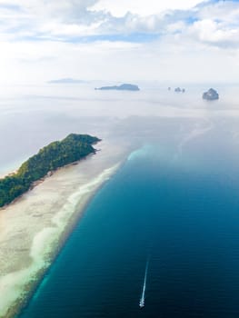 Drone top aerial view at Koh Kradan a tropical island with a turqouse colored ocean in Koh Kradan Trang Thailand