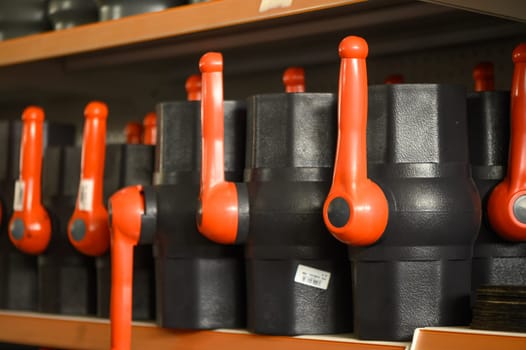 ball valves on a shelf in a store
