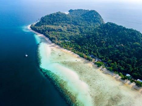 Drone top aerial view at Koh Kradan a tropical island with a turqouse colored ocean in Koh Kradan Trang Thailand