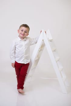 Little children with air balloons on white background. Valentine's Day Celebration.