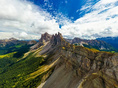 High Seceda mountains and green valley in good sunny day.