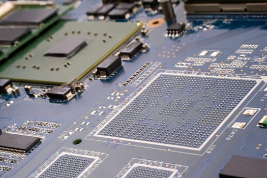Concept cyber security. A detailed shot of a computer motherboard, featuring a CPU, chipsets and circuit board showcasing the intricate engineering and composite materials used in its manufacturing. Selective focus