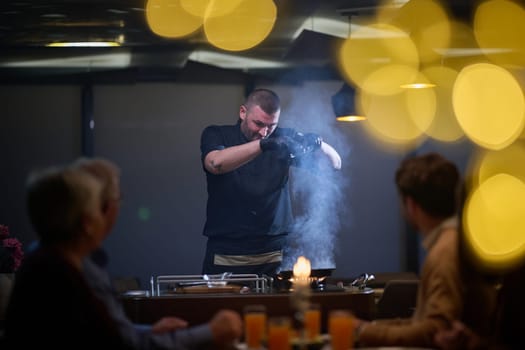 In a restaurant setting, a professional chef presents a sizzling steak cooked over an open flame, while an European Muslim family eagerly awaits their iftar meal during the holy month of Ramadan, blending culinary artistry with cultural tradition in a harmonious dining experience.