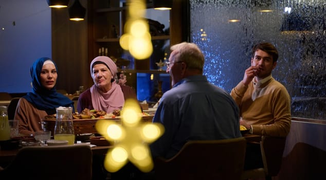 A modern and traditional European Islamic family comes together for iftar in a contemporary restaurant during the Ramadan fasting period, embodying cultural harmony and familial unity amidst a culinary celebration of diversity.