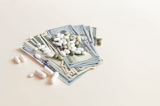 Closeup Many Dollar Money Banknotes And Different Pills Or Tablets. Expensive Medicine And Healthcare Insurances. Inflation. Big Pharma, Pharmaceutical Industry. Horizontal Plane