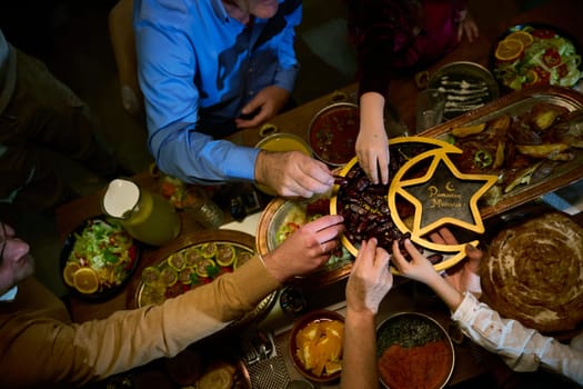 In this modern portrayal, a European Islamic family partakes in the tradition of breaking their Ramadan fast with dates, symbolizing unity, cultural heritage, and spiritual observance during the holy month of Ramadan.