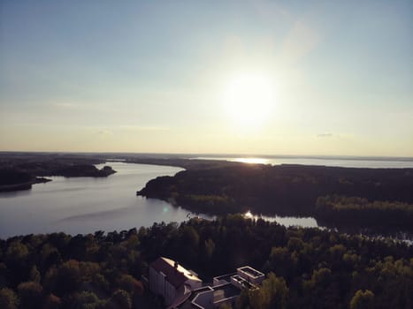 sunset over the park in the city. top view of the river