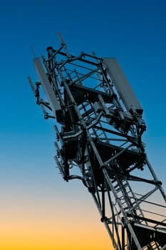 Deployment of the 5G network. Laying antennas on a mobile phone mast in the winter atmosphere. France, Gironde, February 2024. High quality photo