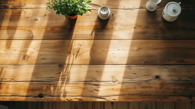 top view of a wooden kitchen table illuminated by sunlight. copy space.