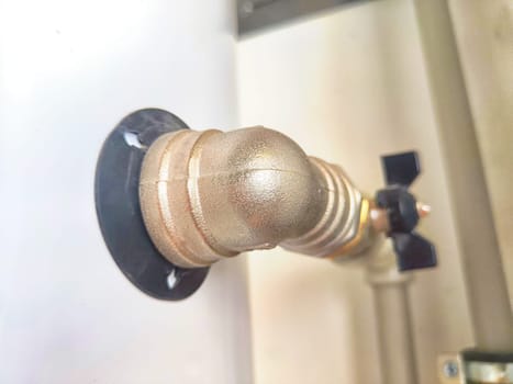 Close-Up of Domestic Water Shut-Off Valves. detailed view of the copper piping and two types of water shut-off valves typically installed in home plumbing system