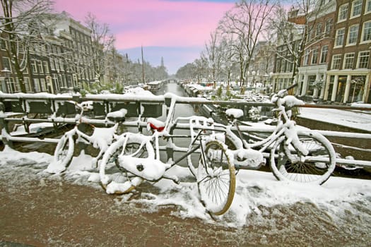 Amsterdam in winter in the Netherlands at sunset