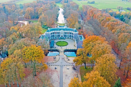 Aerial from castle Groeneveld in the countryside from the Netherlands in fall