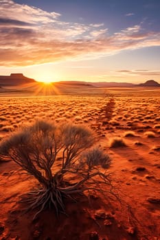 Scenic view of rugged, rocky mountains with uneven peaks and a dry brown surface under a blue sky in the Bardenas Reales desert. A picturesque desert landscape.