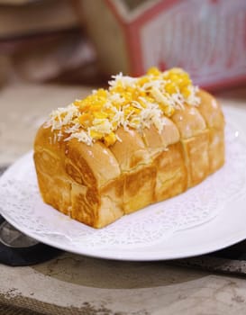 Fresh grilled delicious sandwich with topping and filling plated in white plate, just freshly baked in the restaurant