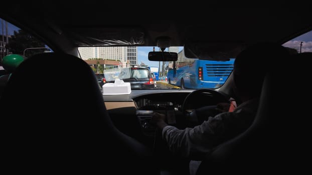 Inside the interior of a cab car in Jakarta. Indonesia