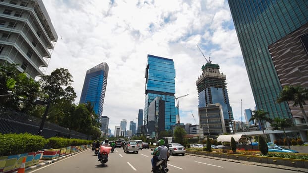 Jakarta's roads and streets with cars during the daytime