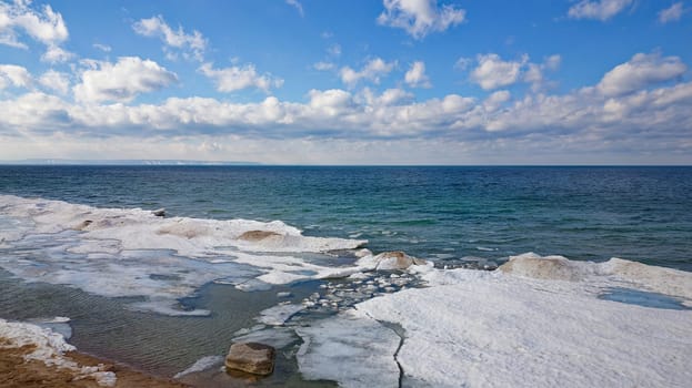 Drone shot of Georgian Bay Ice Pack Breaking Up and Melting in February due to Warming Climate