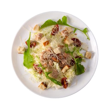 Plate with Traditional Caesar Salad with Chicken and Bacon isolated on White Background. Top view.