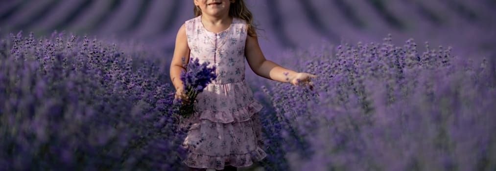 Lavender field girl. happy girl in pink dress in a lilac field of lavender. Aromatherapy concept, lavender oil, photo session in lavender.