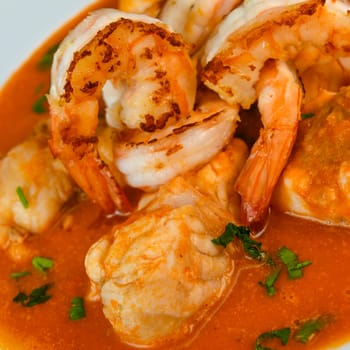 Recipe for Armorican-style monkfish tail, prawns, flambees with cognac, High quality photo
