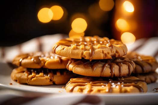 Chocolate chip cookies scattered with chocolate morsels on dark background