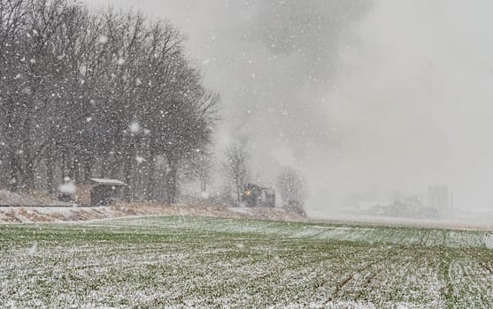 An Approaching Stem Passenger Train, in a Snow Storm, Blowing Black and White Smoke